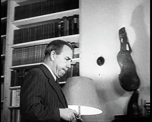 Priestly: J.B. Priestly Walking Across a Room