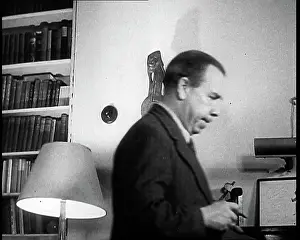 Priestly: J.B. Priestly Walking Across a Room