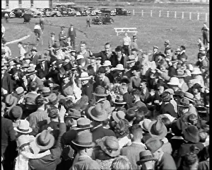 Batten: Jean Batten Walking Through a Crowd