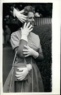 Creepy: Jean Carpenter with unusual hand accessories, Wimbledon