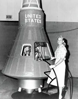 Aviatrix: Jerrie Cobb Poses with Mercury Capsule