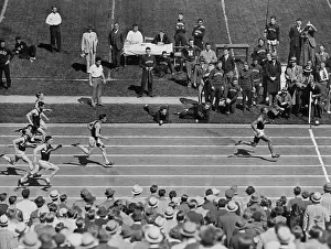 Evanston: Jesse Owens leading the hundred-yard at a