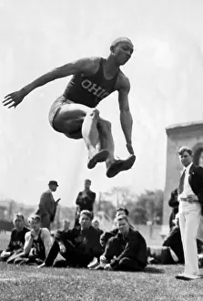 Breaks: Jesse Owens during the long jump, 1935