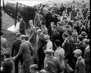 Mollison: Jim Mollison Walking to His Plane With a Large Crowd