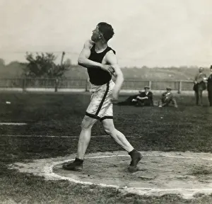 Decathlon: Jim Thorpe throwing discus, one event of the