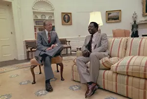 Braves: Jimmy Carter chatting with Hank Aaron in ?