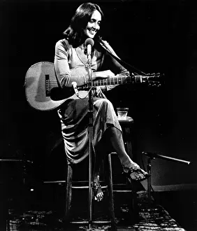 Baez: Joan Baez relaxes between songs during her ?