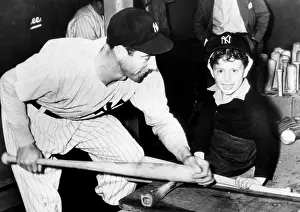 Dimaggio: Joe DiMaggio shows his son, Joe Jr. how ?