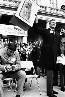 Booed: Joe Namath, examines a bronze medallion ?