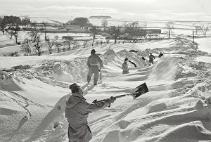 Clearing: John clearing snow