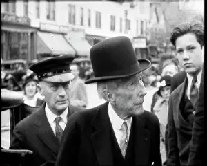 John D Rockefeller in a Suit and Hat Getting
