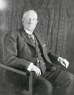 C1909: John D. Rockefeller, three-quarter length portrait, seated