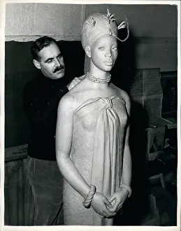 Benin: John Danford, sculptor, working on statue for Benin, Nigeria