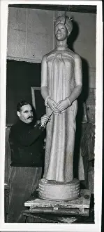 Benin: John Danford, sculptor, working on statue for Benin, Nigeria