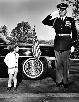 Eldon: John F. Kennedy Jr. look up at Sgt. Eldon ?