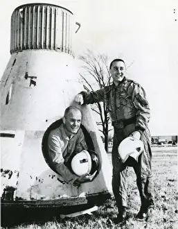 Grissom: John Glenn and Virgil Grissom pose beside Mercury spacecraft