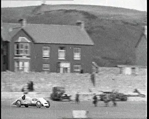 Attempting: John Godfrey Parry-Thomas Driving A Speed Car