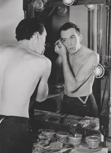 Bare Chested: John Huston making-up for his role in The Lonely