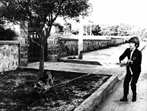 Scorpio: John-John Kennedy with dog, Athens