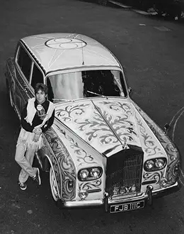 Beatle: John Lennon of The Beatles pop group with Rolls Royce