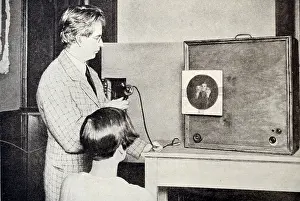 Creator: John Logie Baird Testing a Television