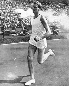 Xivth: John Mark carrying the Olympic torch, opening ceremony, 1948