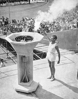 Xivth: John Mark lights the Olympic bowl, opening ceremony, 1948