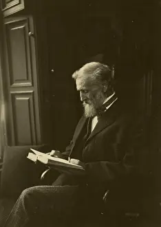 Muir: John Muir, seated, reading a book