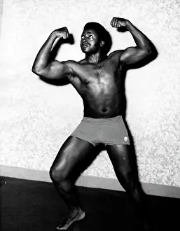 Flexing: John Mwale - Himself a wrestler is perhaps the youngest