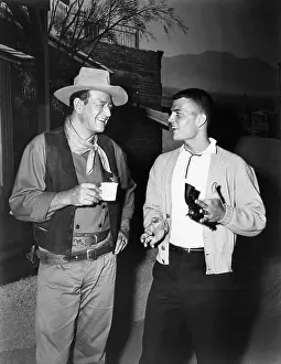 Twirling: John Wayne, and his son, Pat Wayne, circa ?
