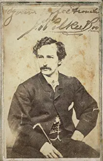 Wilkes: John Wilkes Booth, half-length studio portrait, sitting