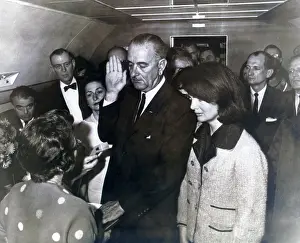 Administering: Johnson taking oath. Ladybird Johnson and ?