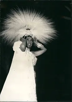 Costly: Josephine Baker, feathered headdress, Olympia Theatre, Paris