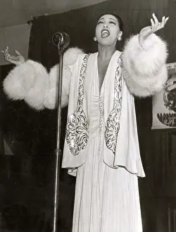 American Born: Josephine Baker singing to British Factory Workers