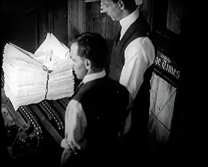 Bundles: Journalists Removing Bundles Of Newspapers
