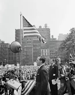 Announcement: June 6, 1944 - Speaker addressing the crowd