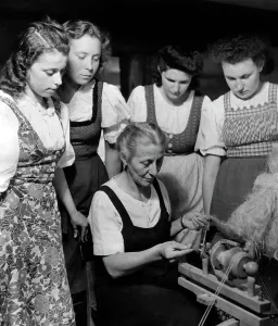 Housework: Jungmaedel learn spinning, 1942