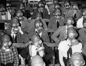 Sovereignty: Jungmaedels learn to put on a gas mask, 1939