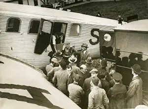 Approximate: Junkers G24 (G23?), S-AAA?. Unloading bullion to the ap?