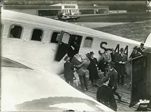 Approximate: Junkers G24 (G23?), S-AAA?. Unloading bullion to the ap?