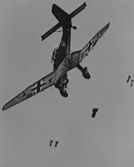 Releases: Junkers Ju 87B -releases its bombs from low level with