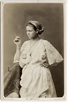 Berber: Kabyle woman with a cigarette. Algeria