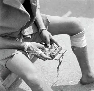 Mbira: Kameya, the player of Angolan type mbira ERP mine