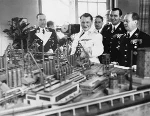 Gasoline: Karl Bodenschatz and Hermann Goering next to a model of a