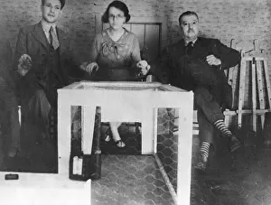 Psychic News: Kathleen Goligher with two men at a sitting
