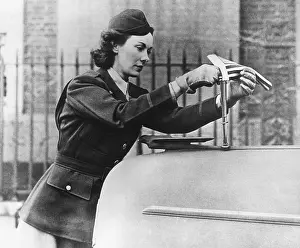 1296: Kay Summersby, attaching an American flag to General
