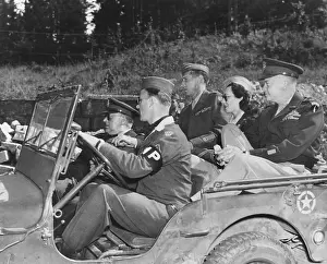 1293: Kay Summersby seated between Generals Eisenhower