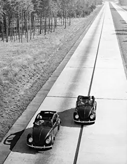 Provisionally: Two KDF Beetles on the highway, near Berlin, 1938