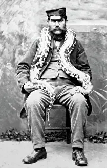 Zookeeper: Keeper with snake at London Zoo