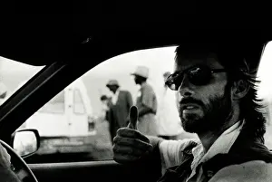 Ken Oosterbroek sitting inside a car. Ken Oosterbroek